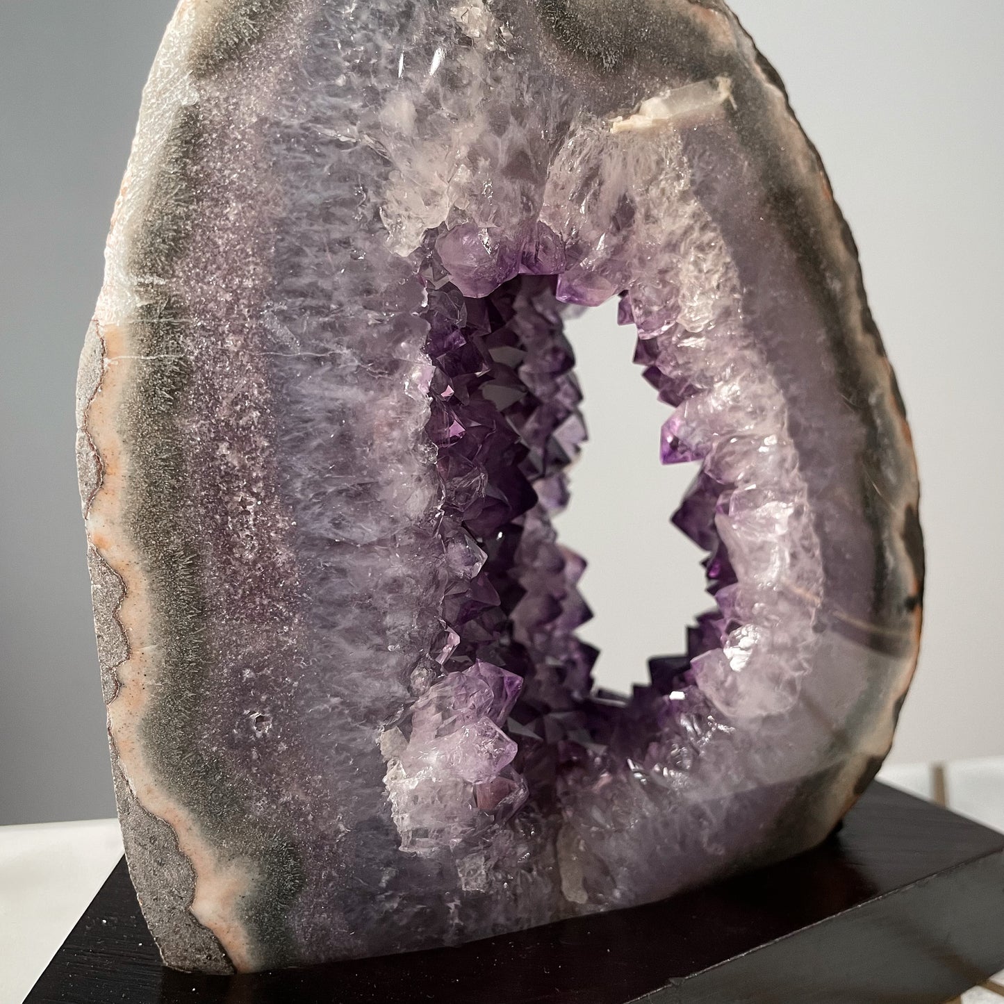 Amethyst Geode Portal on Wood Base